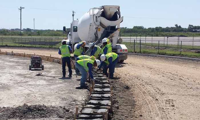 Hellas’  track crew specialists constructing interior trench drain.